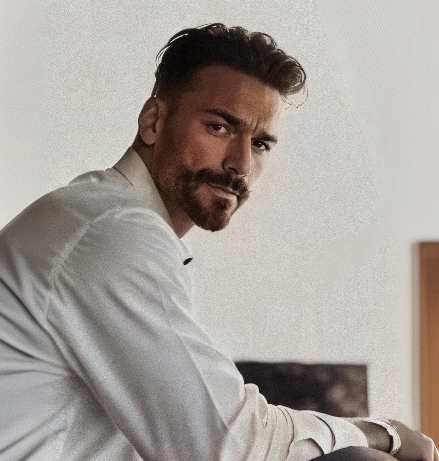Gianluca Margheri in a white shirt, natural light portrait